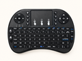 Mini Clavier Sans Fil avec Souris Intégrée – Compact & Universel
